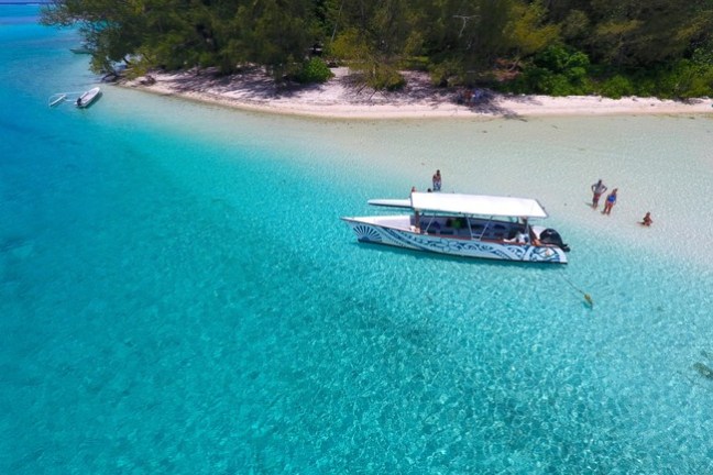 a small boat in a body of water